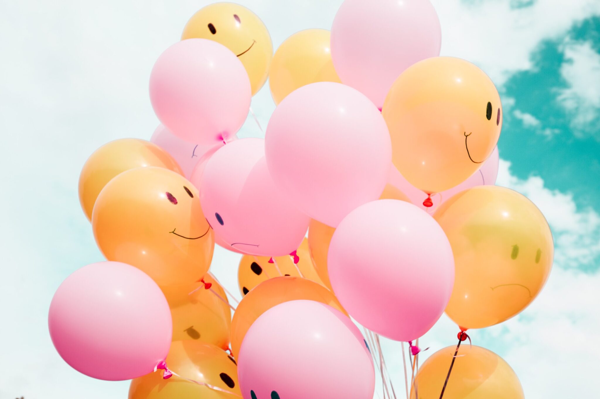 balloons with happy face to illustrate a happy successful transition of adult children and aging parents living together